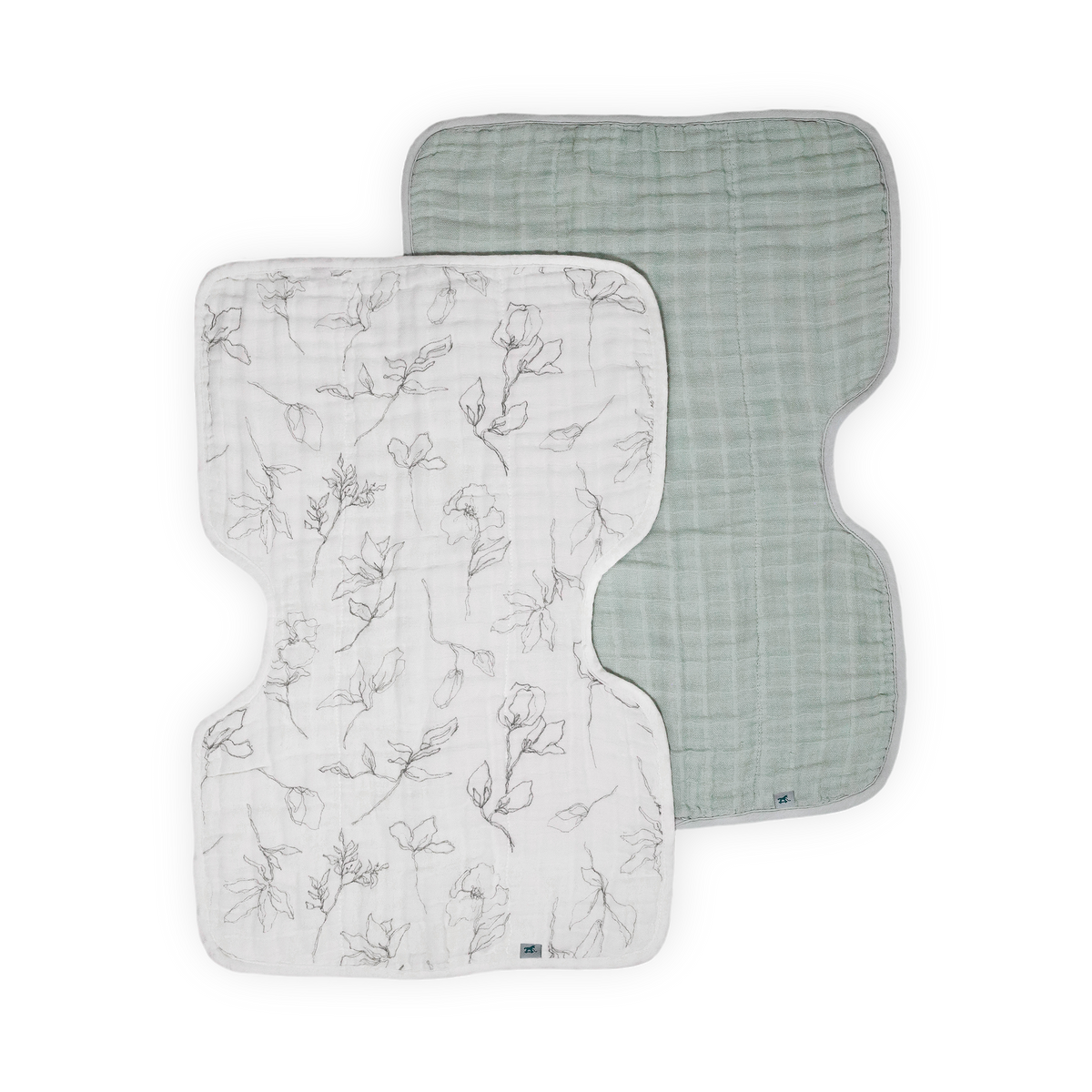 Two muslin baby swaddle burp cloths overlapping on a white background. The front blanket is white with a delicate gray floral line print, and the back blanket is a soft sage green with a subtle grid texture.
