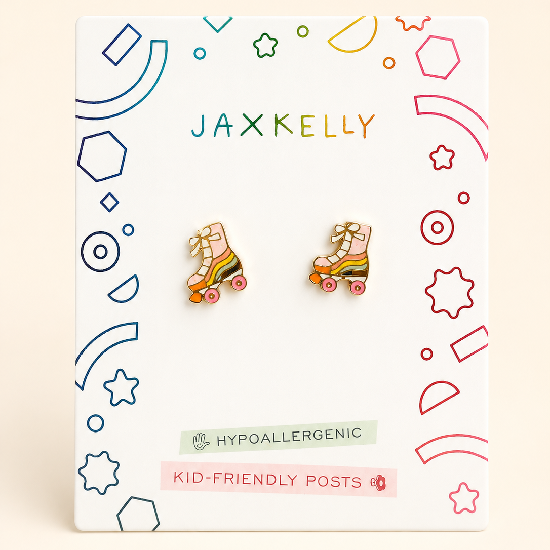 A pair of colorful roller skate stud earrings displayed on a white JAX KELLY brand card. The card features playful multicolor geometric line drawings and text indicating 'KID-FRIENDLY POSTS' and 'Hypoallergenic'.