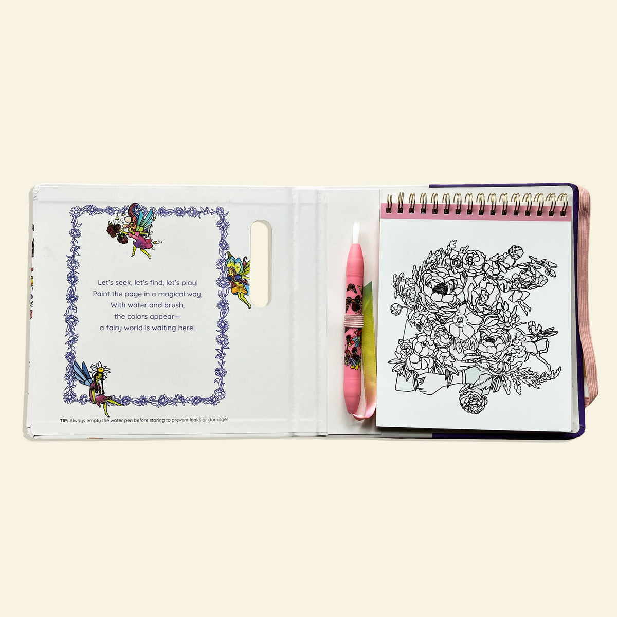 Coloring book open to a page with a floral design and a pen next to it on a white background