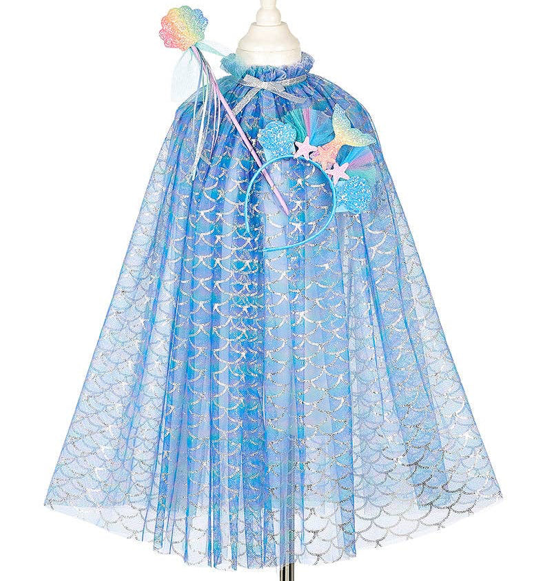Blue dress with floral details on a mannequin against a white background
