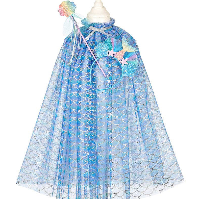 Blue dress with floral details on a mannequin against a white background