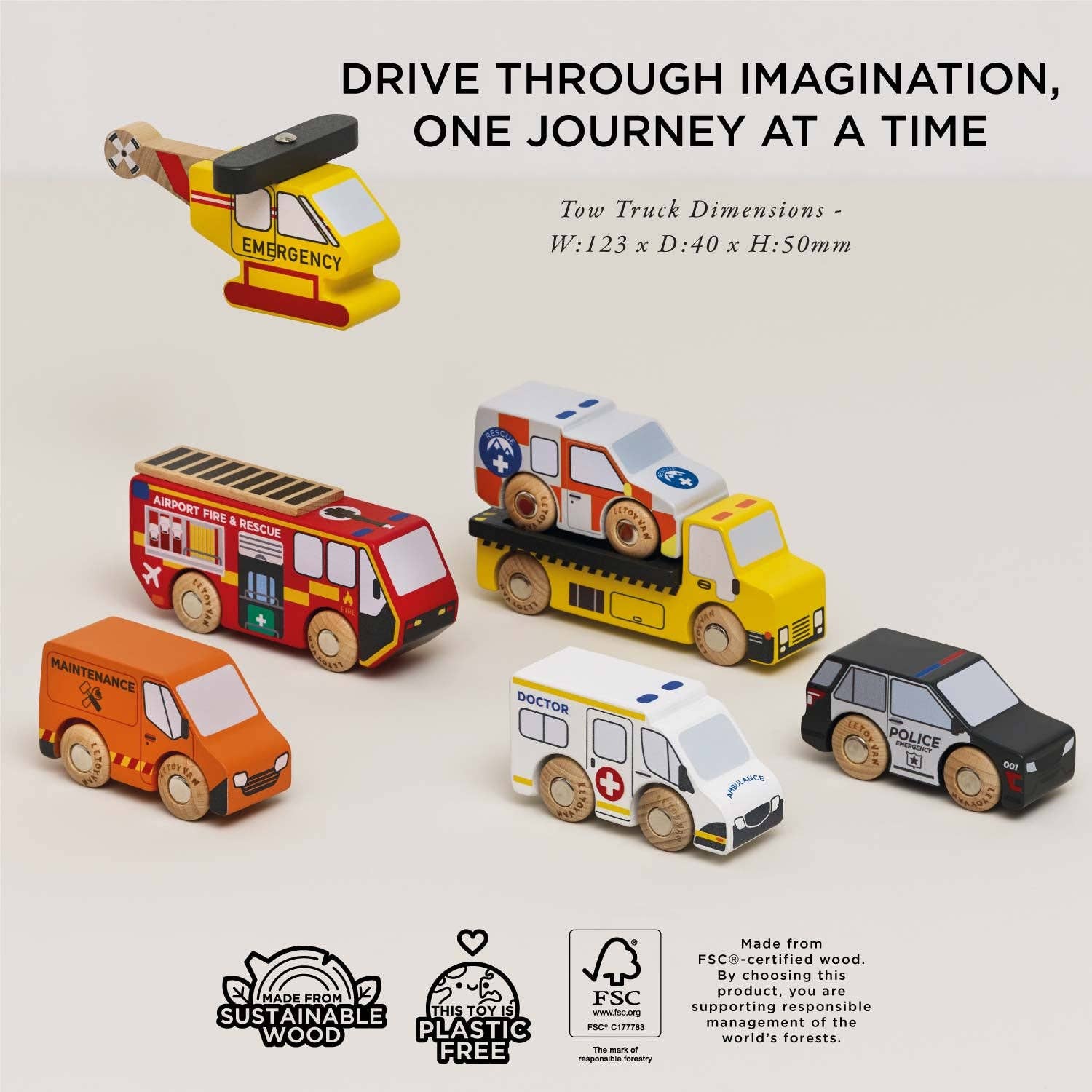 Set of wooden toy emergency vehicles including a helicopter, fire truck, ambulance, and police car on a white background.