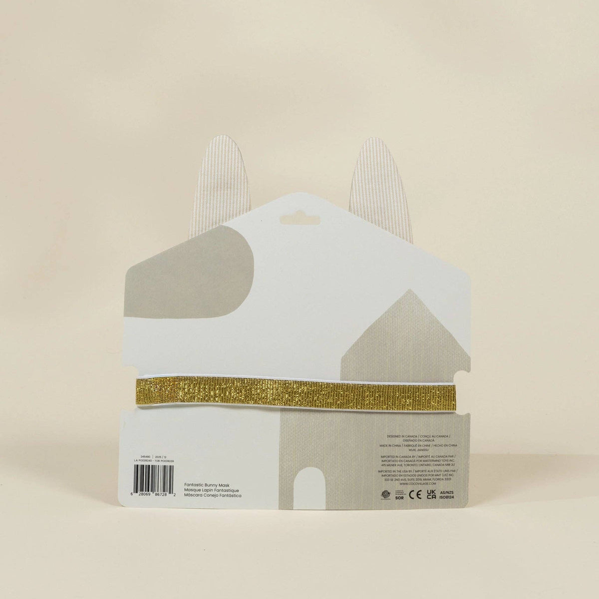 Product packaging with gold band on a beige background