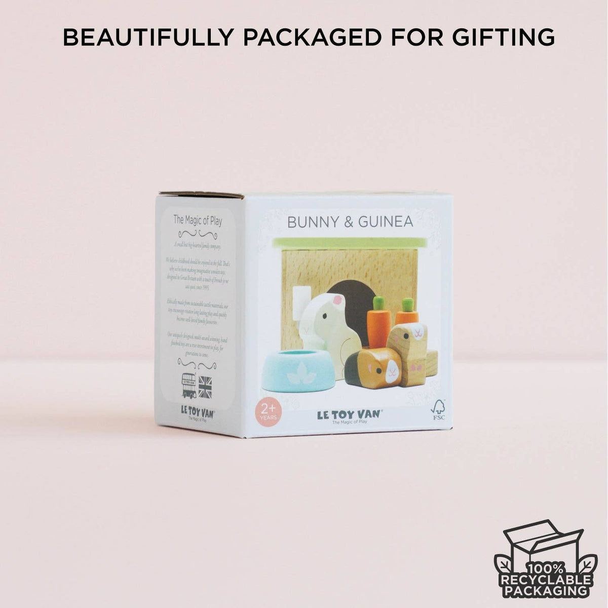 Le Toy Van packaging with toys inside on a light pink background