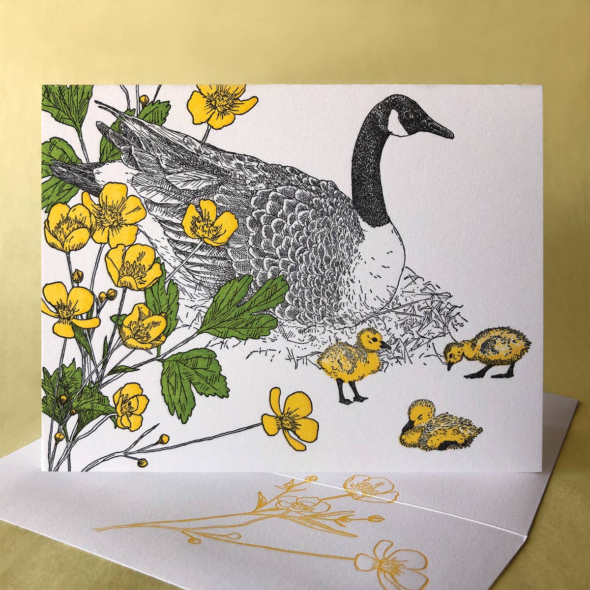 Greeting card with a goose and ducklings illustration on a white background