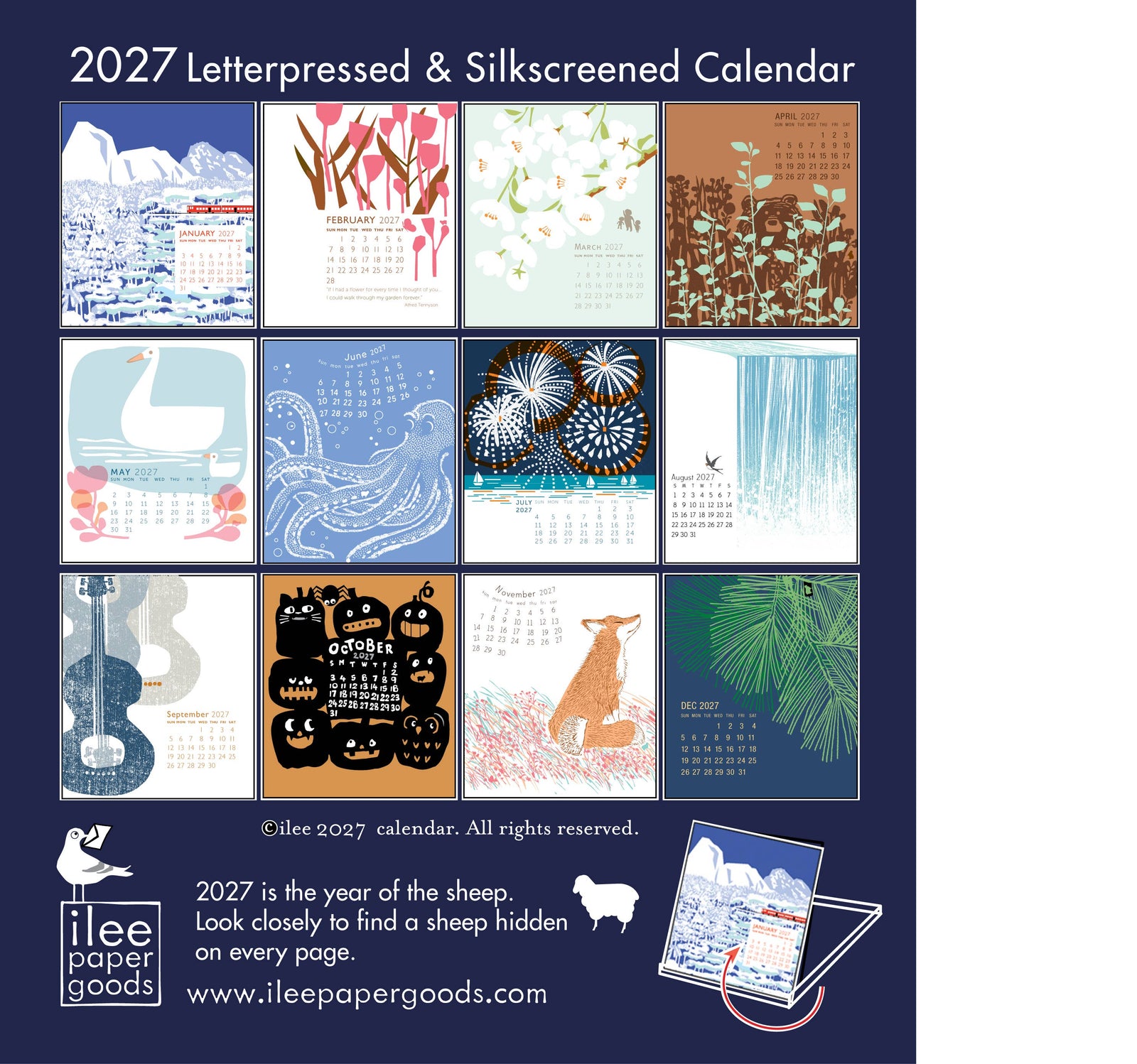 A clear acrylic desk calendar stand holding a printed calendar page with a fox illustration and the date November 2021. The page shows a white background with a brown fox sitting in multicolored grass and a small calendar grid at the top.