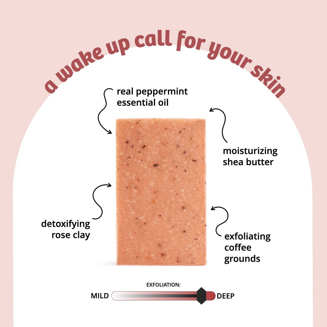 Skincare bar with labeled ingredients on a pink background