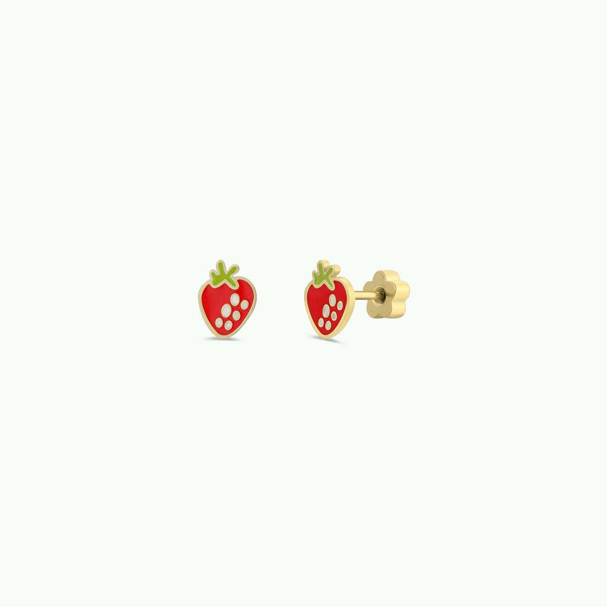 Gold strawberry-shaped earrings on a white background