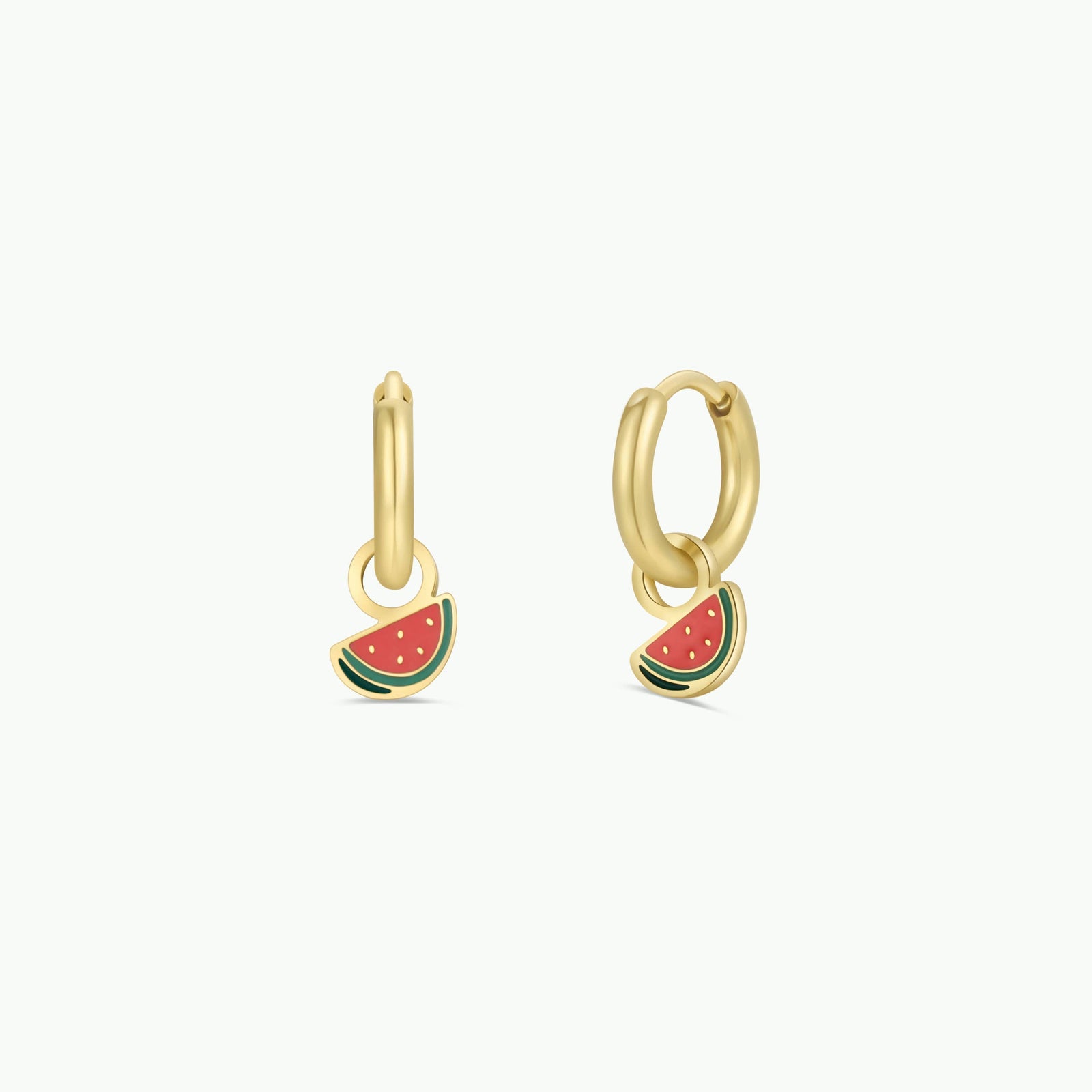 Gold hoop earrings with watermelon slice charms on a white background