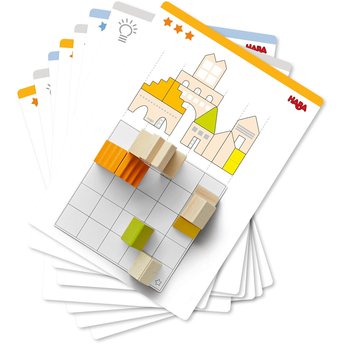 Children's building blocks and cards with HABA branding on a white background