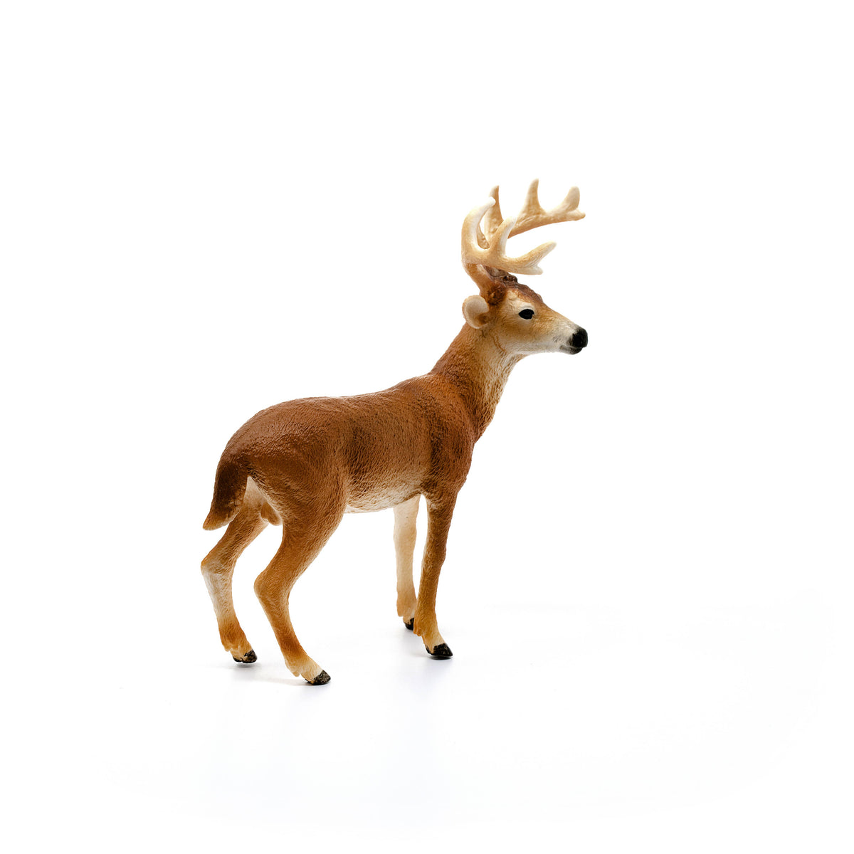Deer figurine on a white background