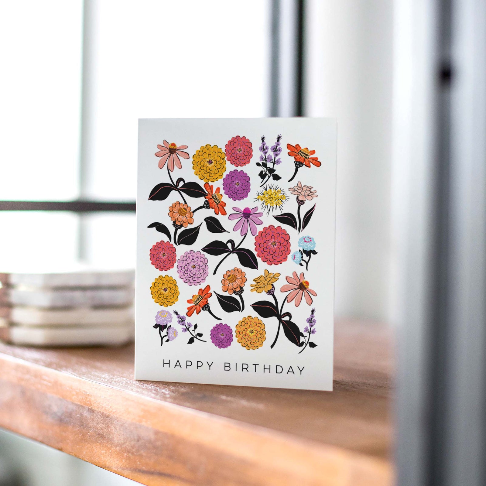 Zinnia flowers design birthday card with colorful flowers and 'Happy Birthday' text on a white background