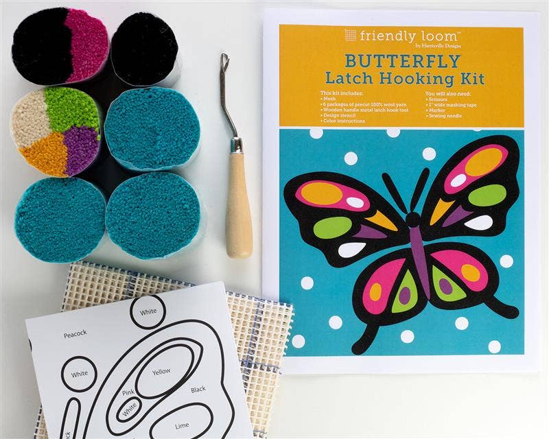 Butterfly latch hooking kit packaging with colorful butterfly design on a yellow background