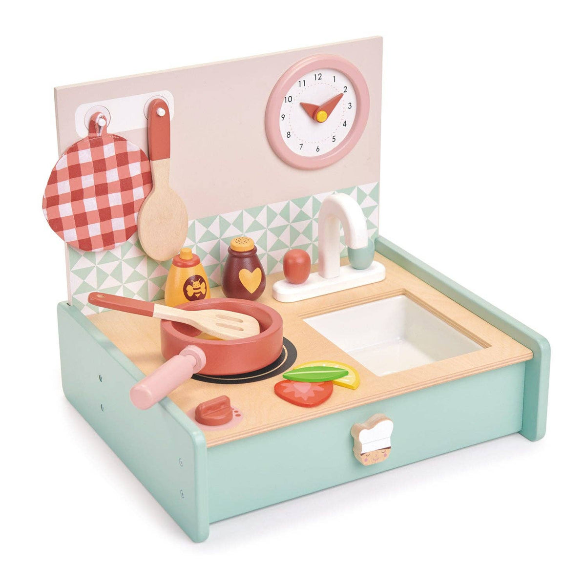 Toy kitchen set with various utensils and a clock on a white background