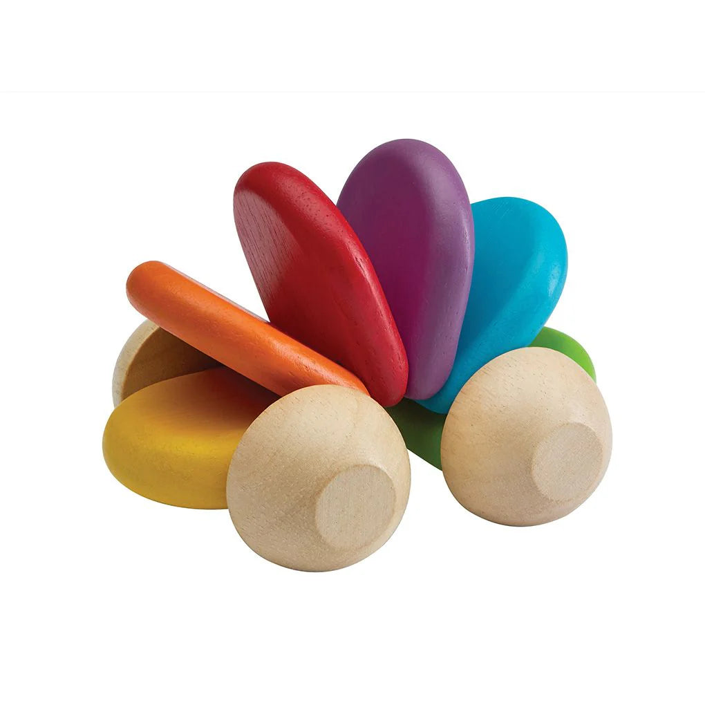 Colorful wooden toy with multicolors on a white background