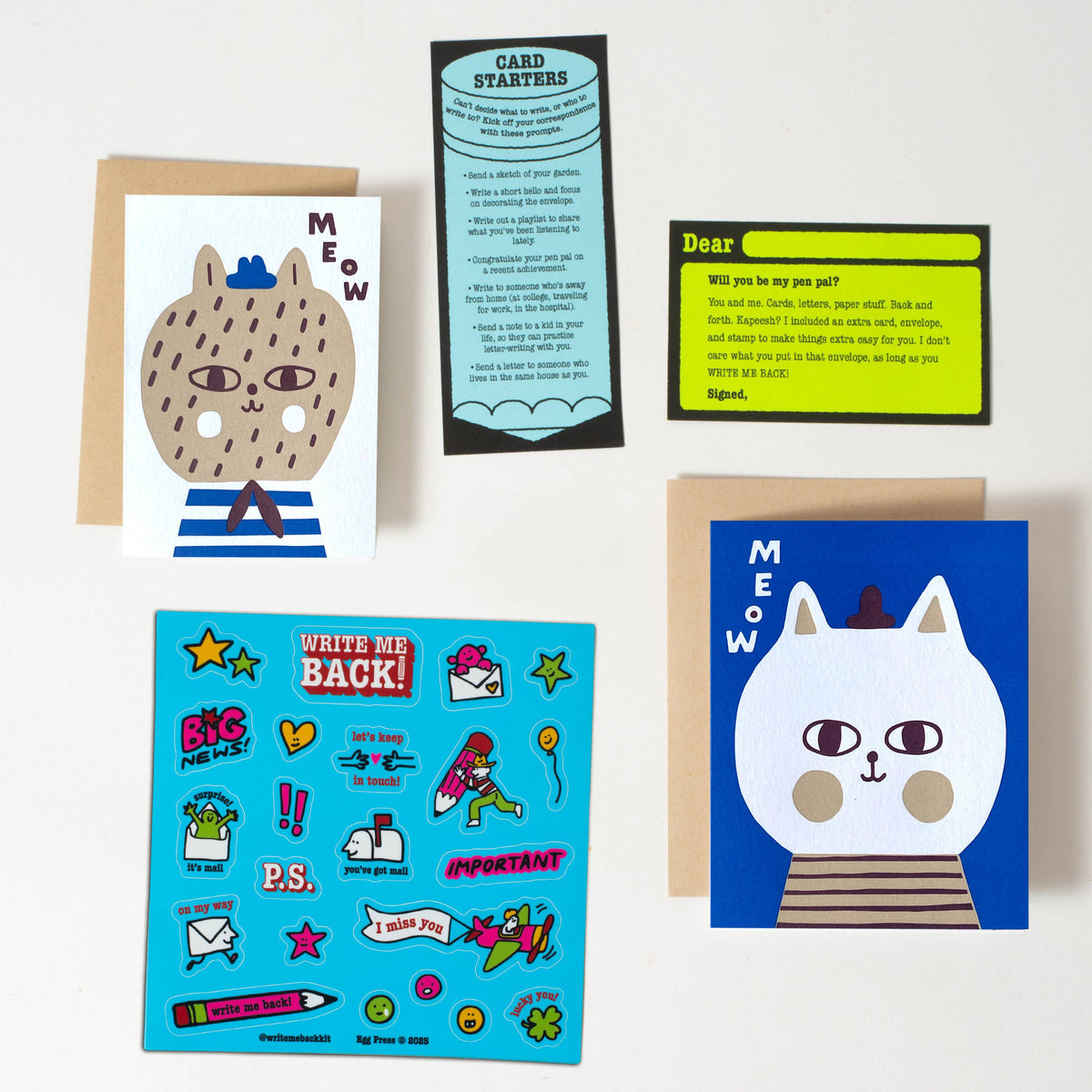 Collection of greeting cards with cat illustrations on a white background