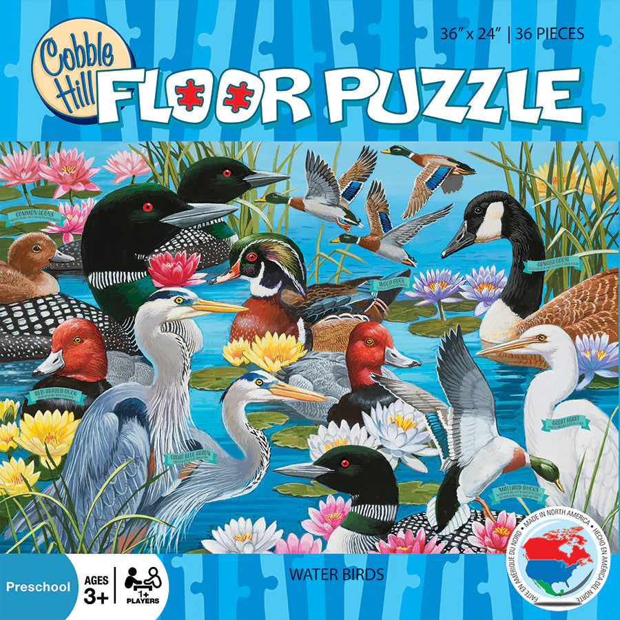 Cobble Hill floor puzzle packaging featuring water birds on a blue background