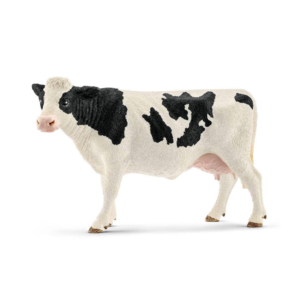 Model of a cow with black and white pattern on a white background