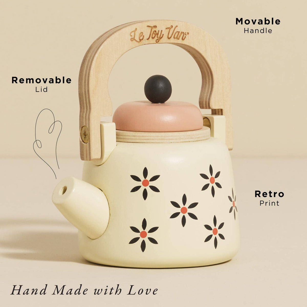 Children's tea pot with floral design on a beige background, featuring 'Le Toy Van' branding.
