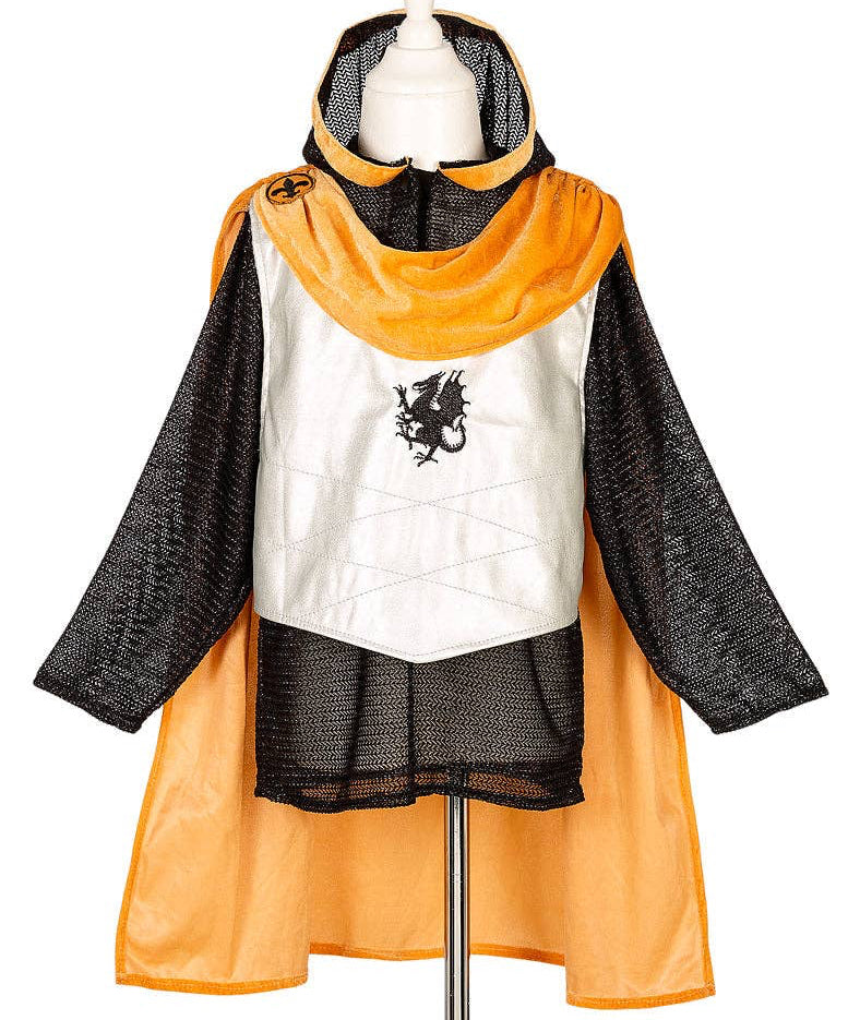 Orange and black outfit with a white shirt featuring a black design on a mannequin against a white background