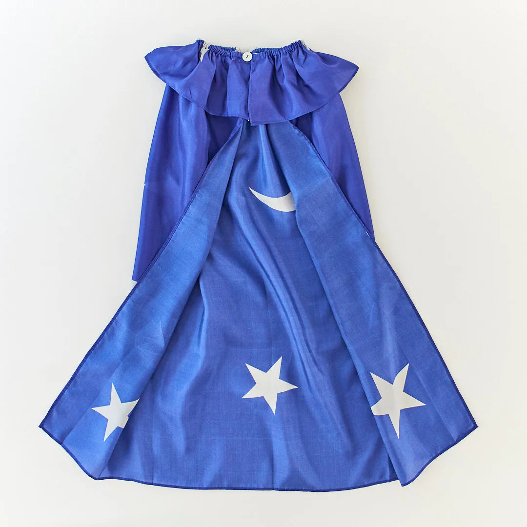 Blue cape with white stars and a moon on a white background