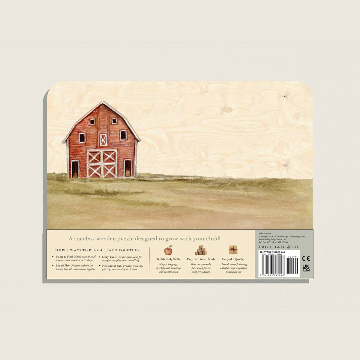 Back of a wooden puzzle packaging with a red barn illustration and text.