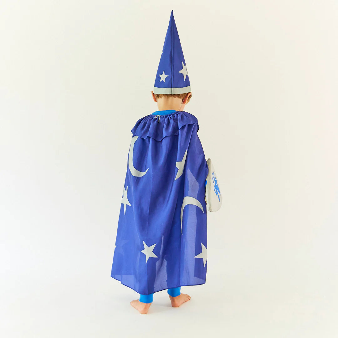 Blue cape with white stars and a moon on a white background