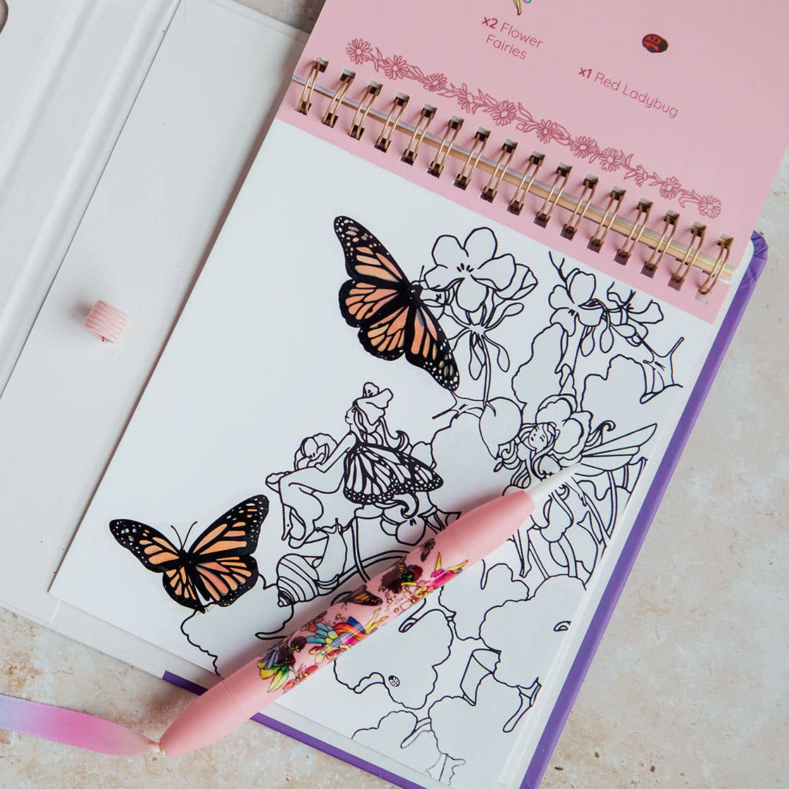 Children's activity pad with Flower Fairies design on a white background