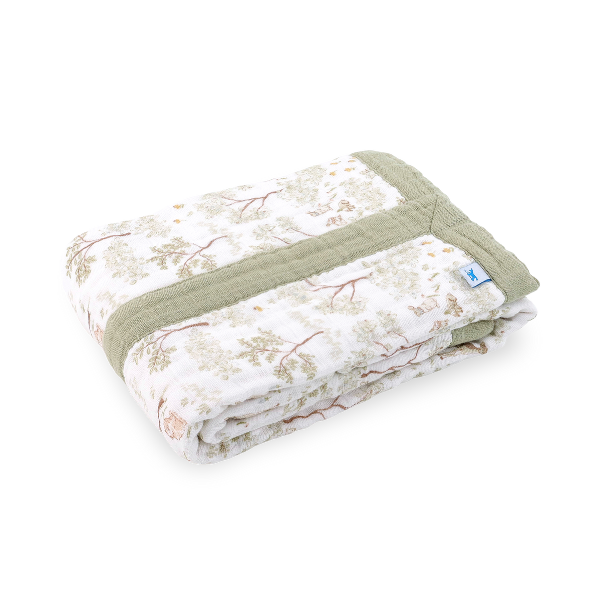 A folded muslin baby blanket with a white background, a sage green border, and a delicate tree branch pattern in muted green and brown, shown on a clean white background.
