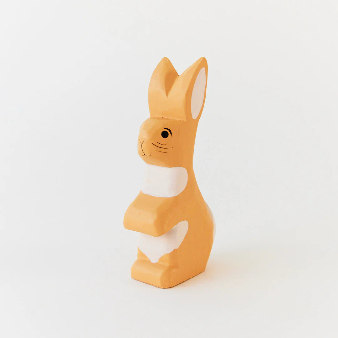 Rabbit figurine on a white background