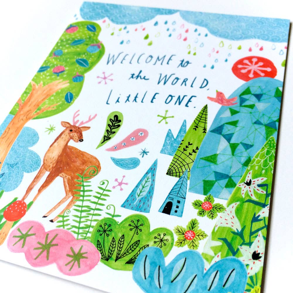 Colorful greeting card with a deer, text 'Welcome to the World, Little One', and nature-themed design.