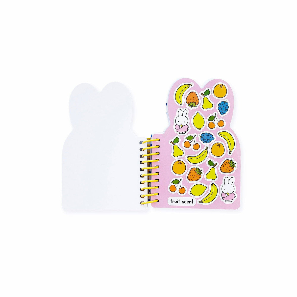 Small spiral-bound notebook with fruit illustrations on a white background