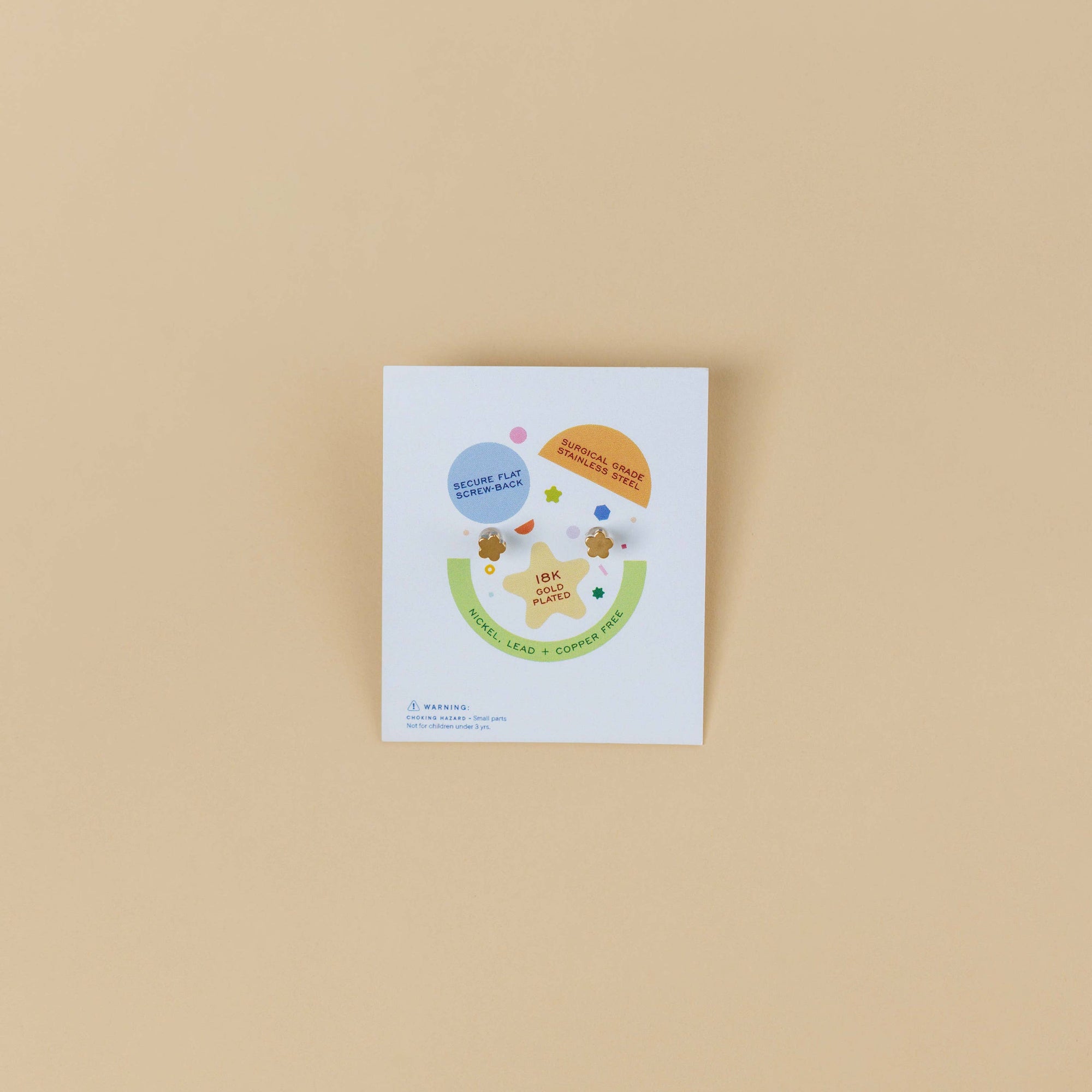 Jewelry card with earrings on an orange background