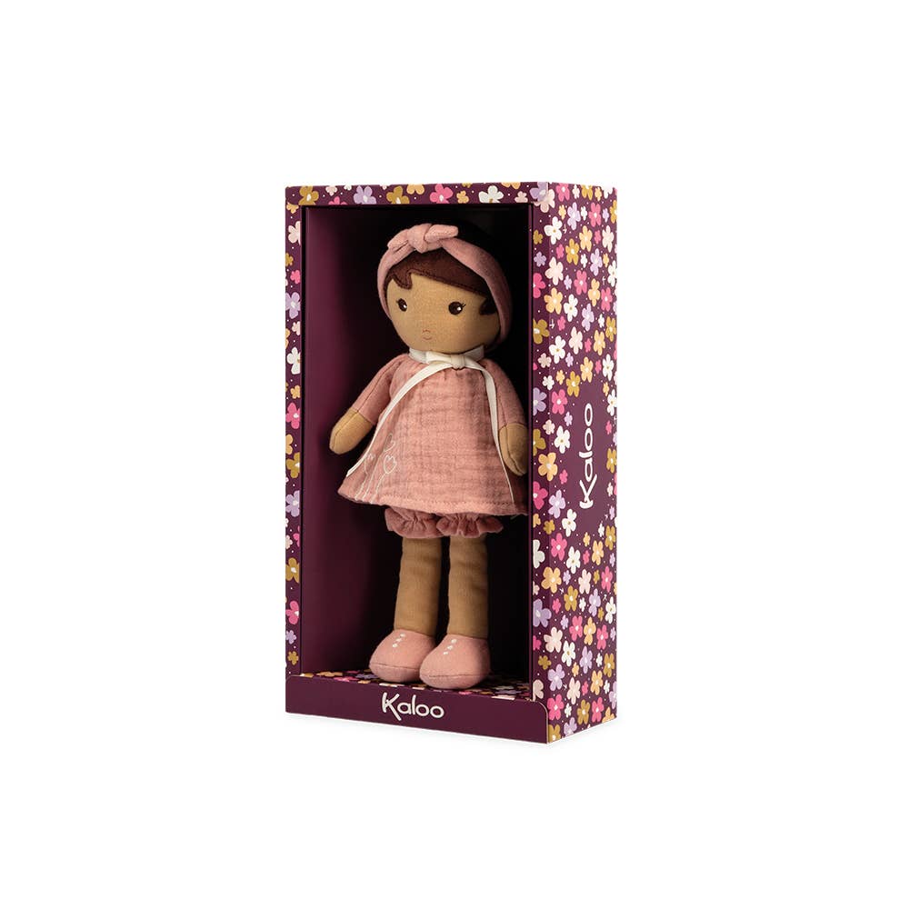 Stuffed doll in a floral-patterned box with 'Kaloo' branding on a white background