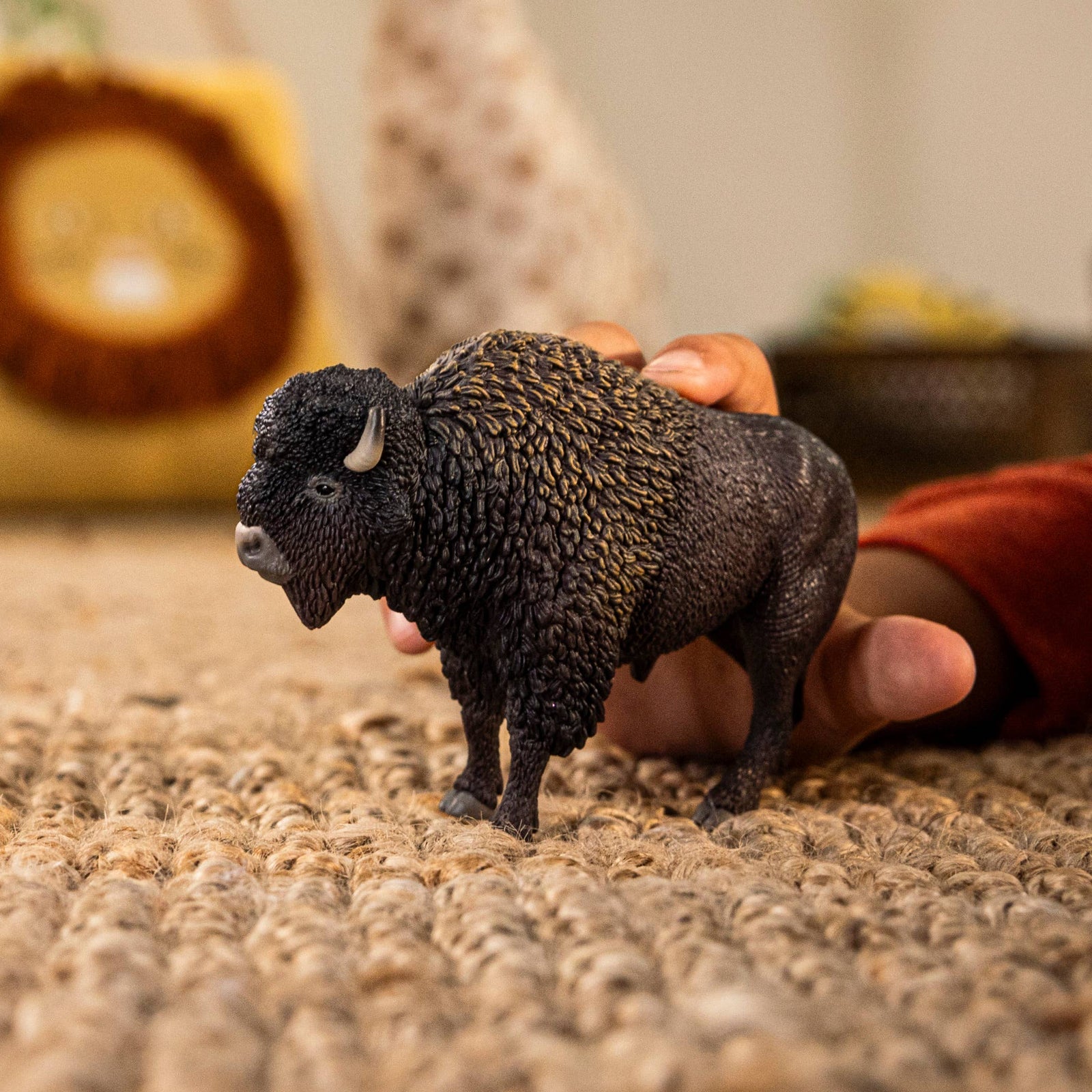 Model of a bison on a white background