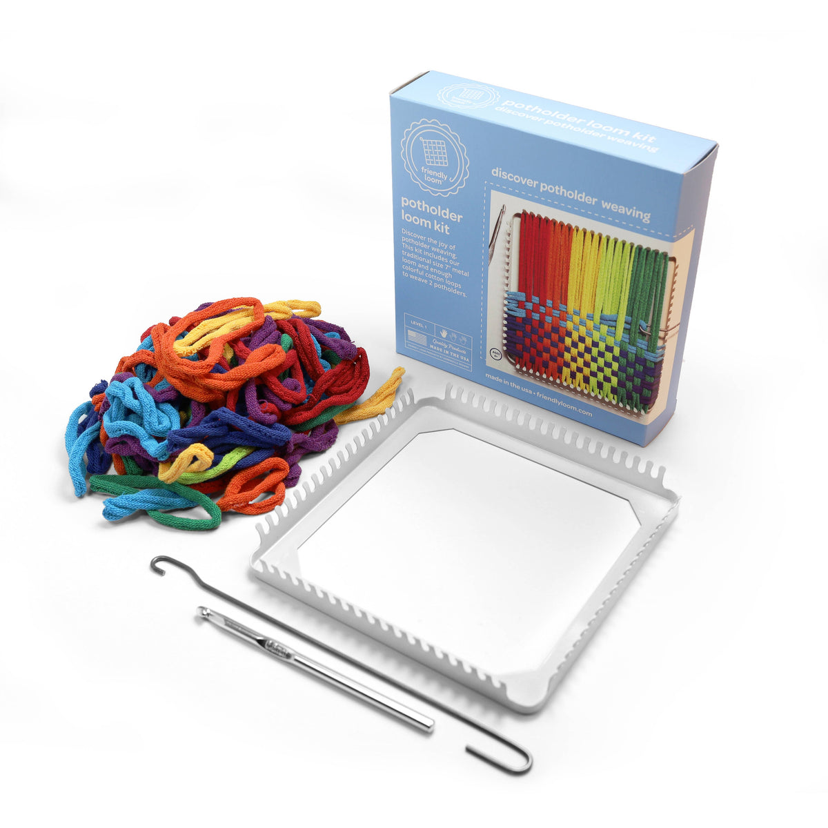 Weaving kit with colorful yarn, loom, and tools on a white background