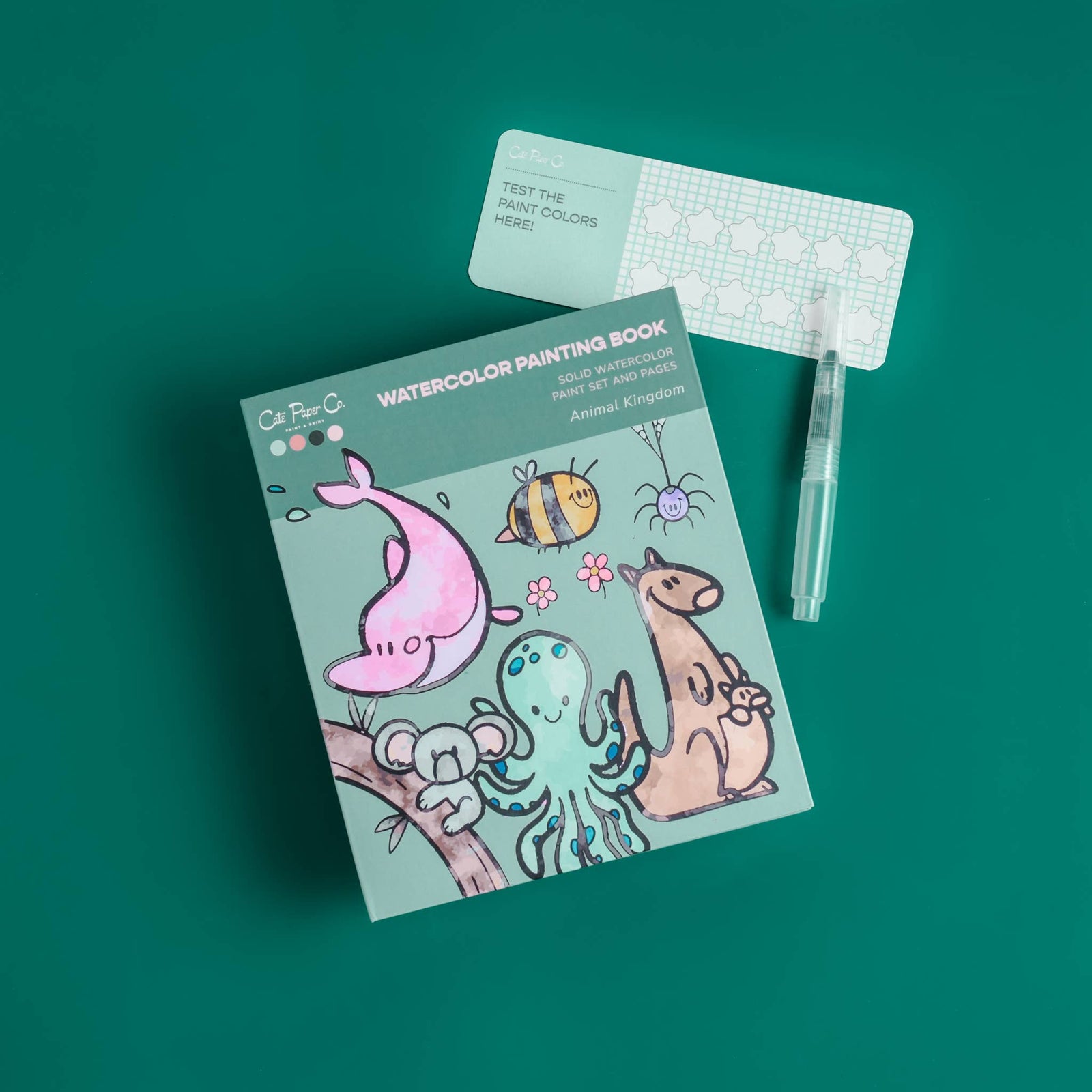 Watercolor painting book with illustrations of animals on a green background