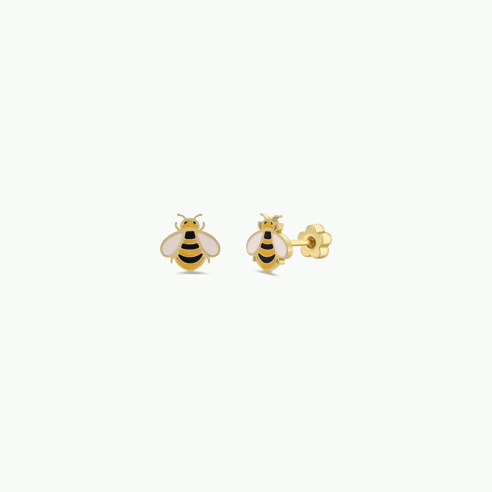 Pair of gold bee-shaped earrings on a Jax & Elle branded card against a beige background