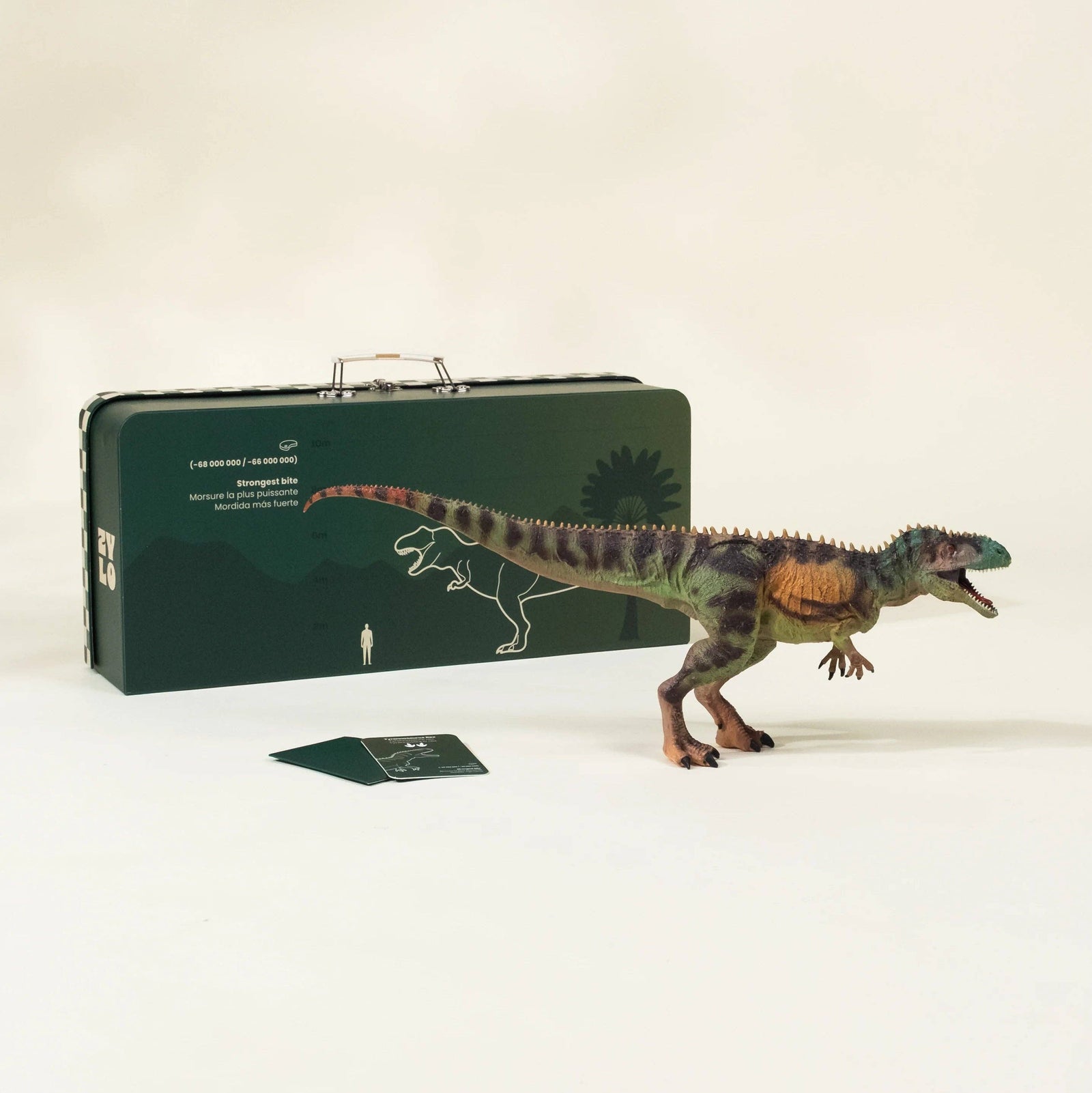 Dinosaur model with a carrying case on a white background