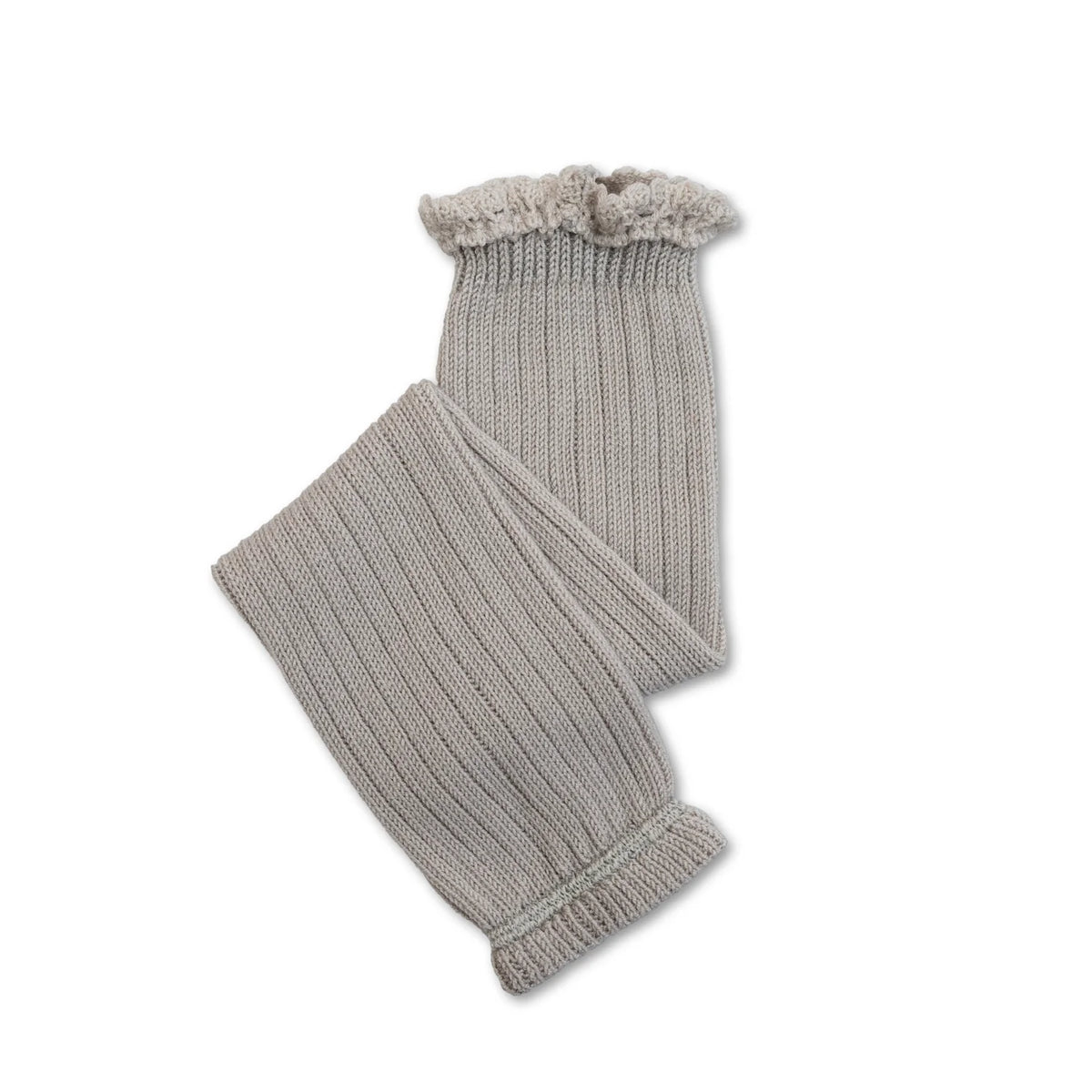 Knitted gray leg warmers with ruffled edge on a white background