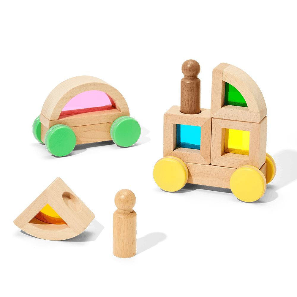 Set of wooden toys including a car, blocks, and shapes on a transparent background