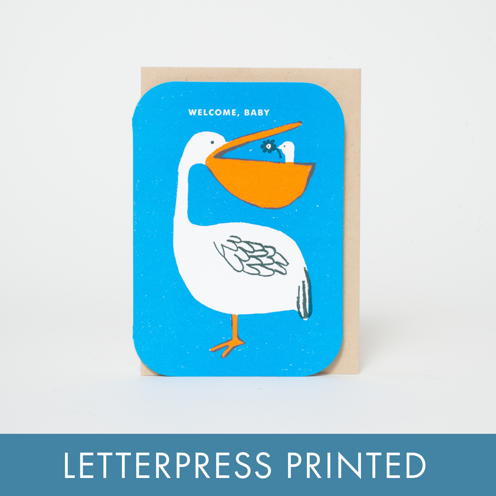 Greeting card with a pelican illustration and 'Welcome, Baby' text on a blue background.