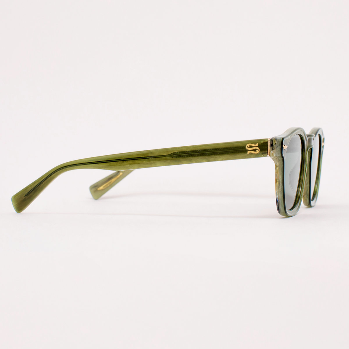Green sunglasses with a logo on a white background