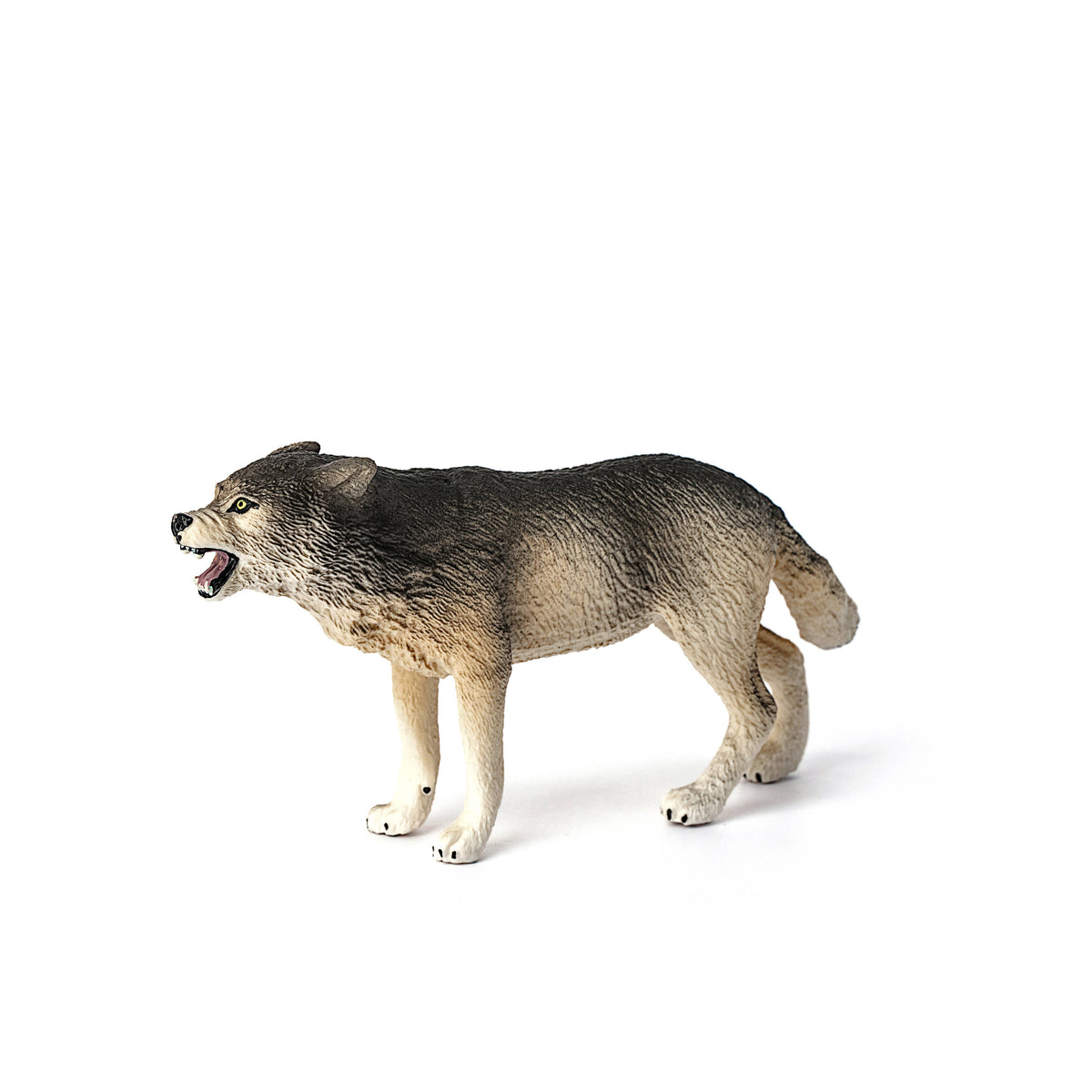 Wolf figurine on a white background