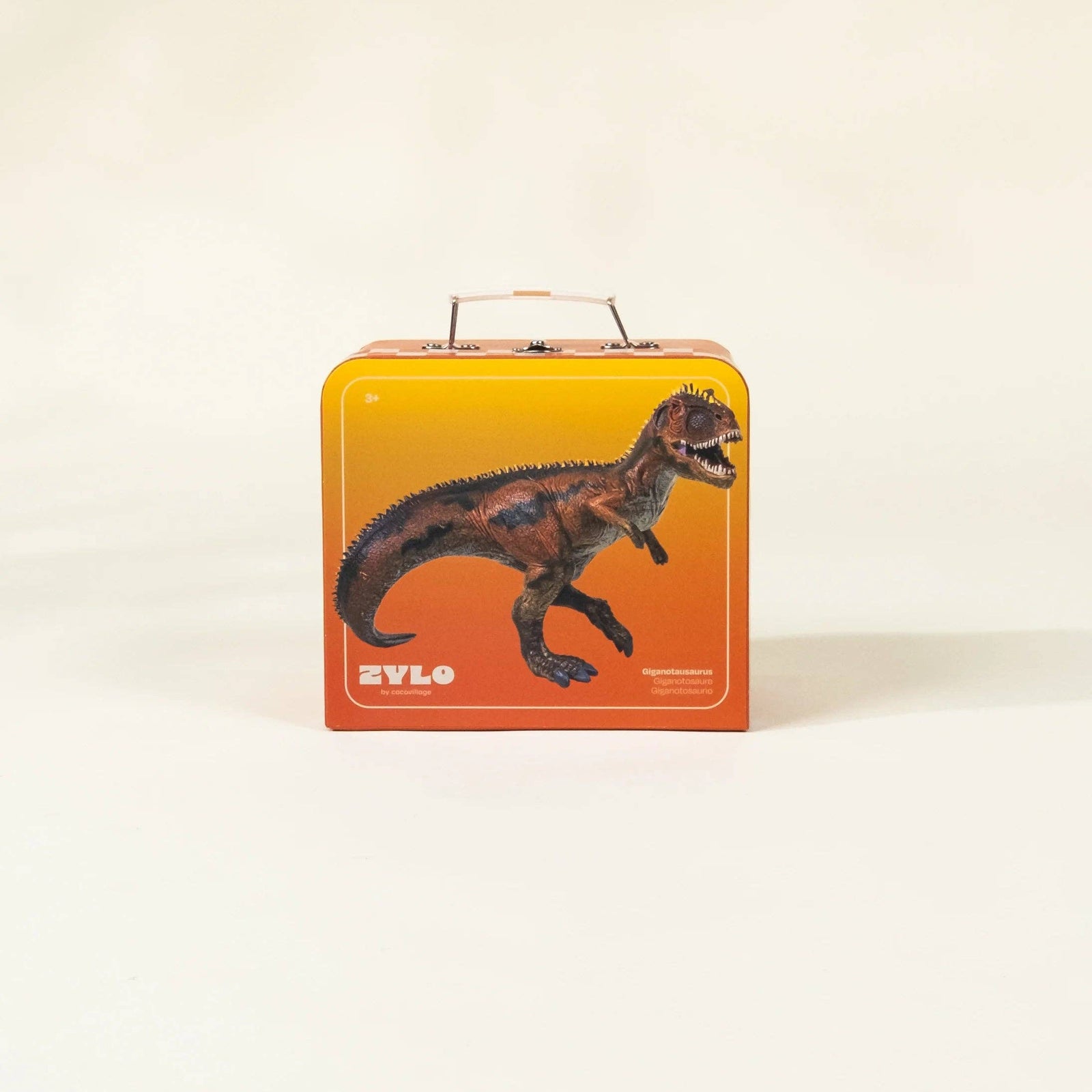 Dinosaur toy in a red suitcase with a checkered bottom on a white background