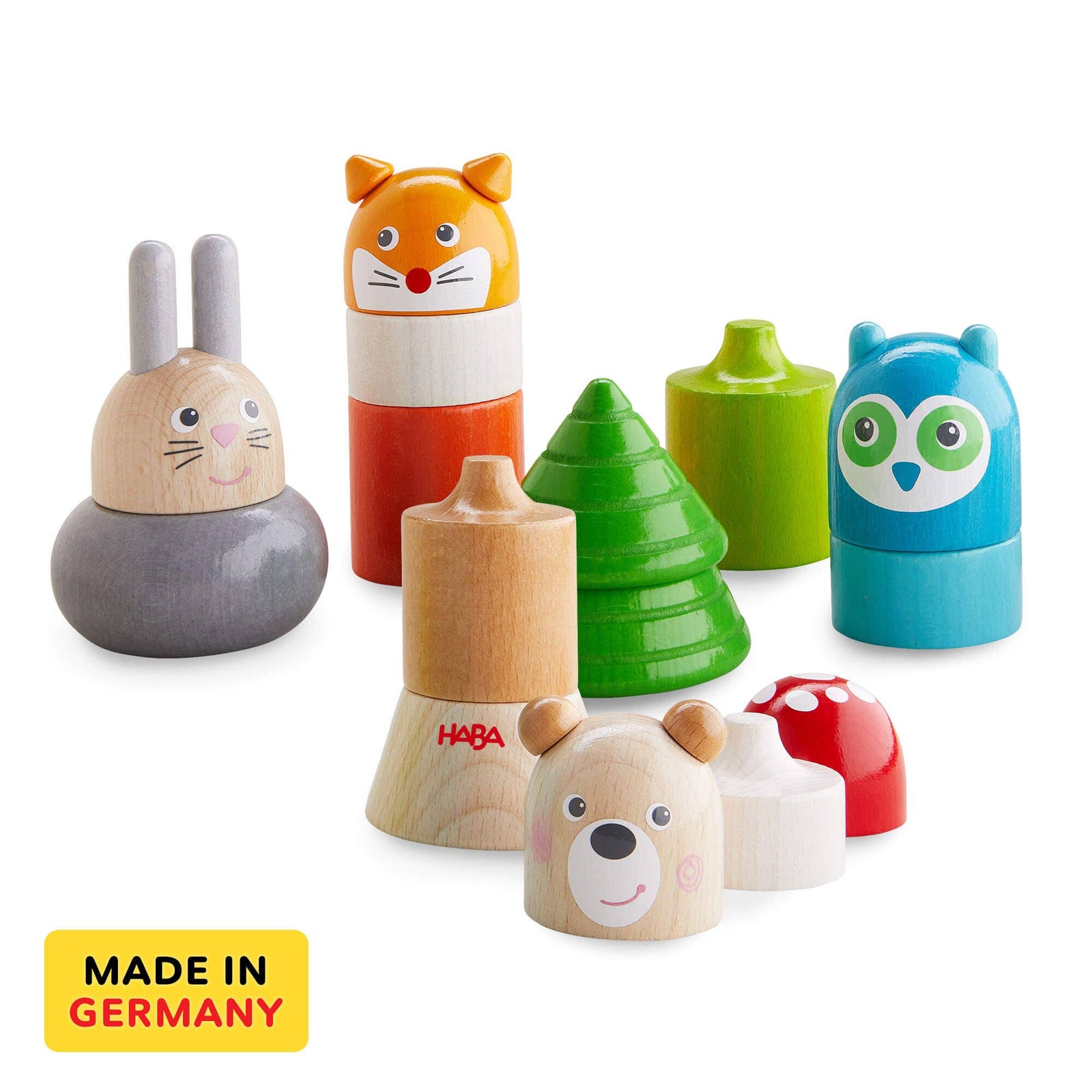 Set of colorful wooden toys with animal designs on a white background, featuring the HABA brand.