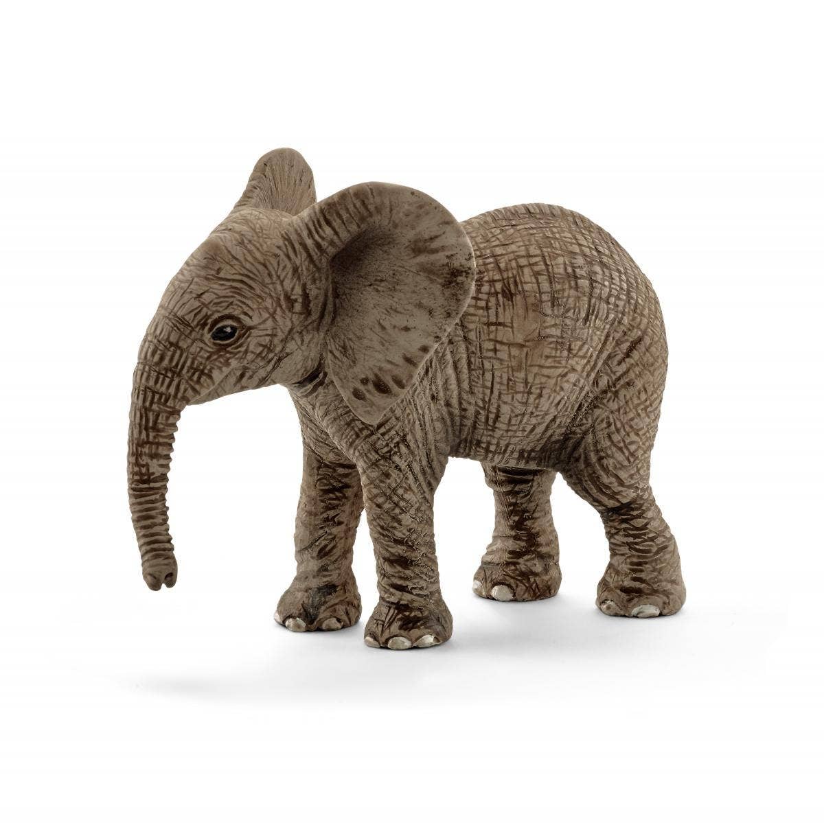 Toy elephant figure on a white background