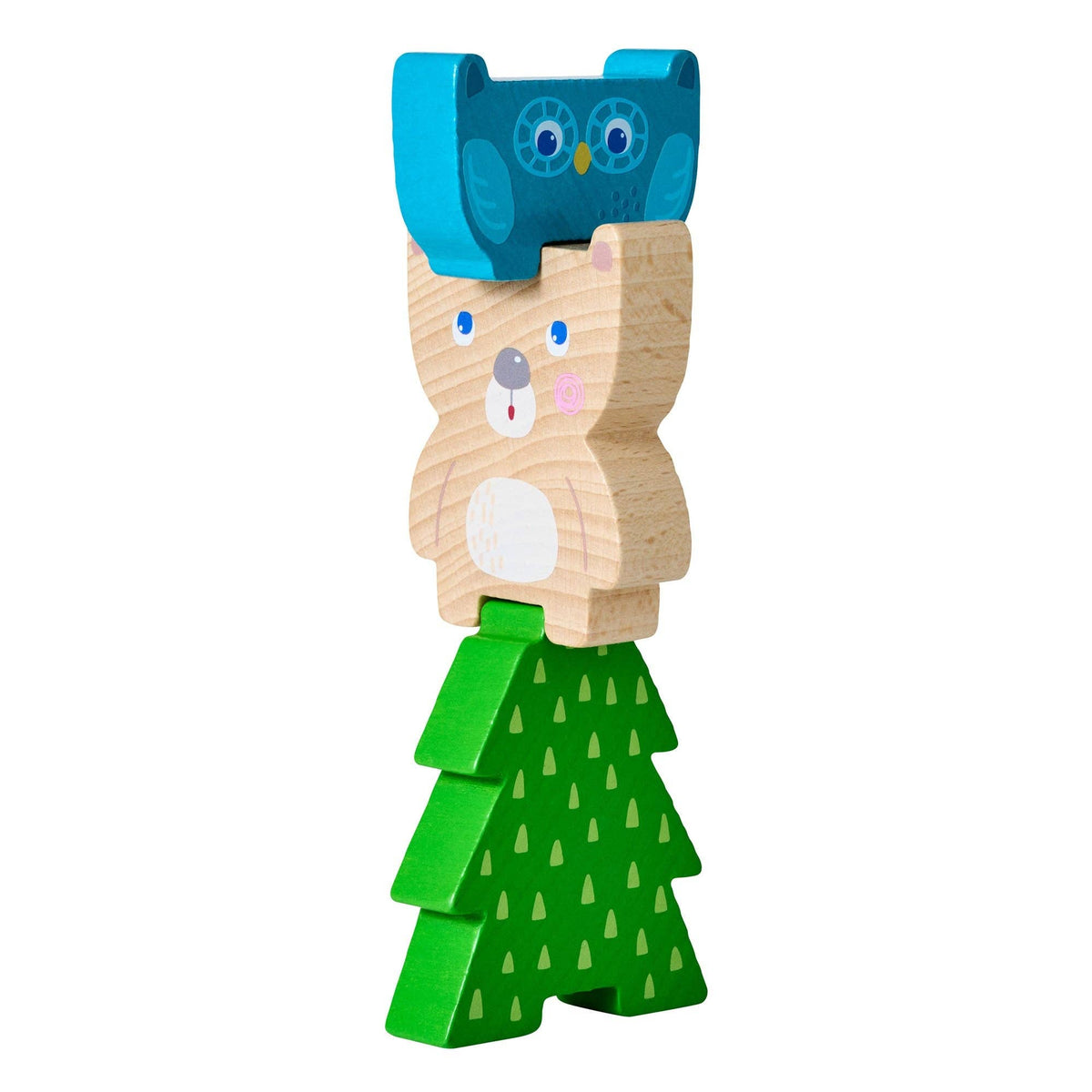 Wooden toy owl with a blue hat and green dress on a white background