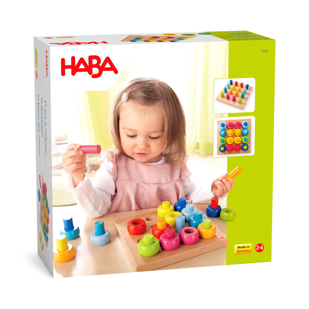 HABA toy packaging with a child playing with colorful wooden toys