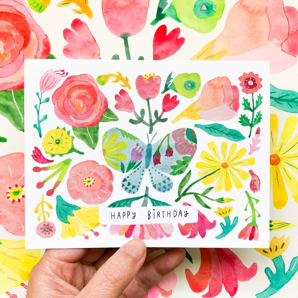 Colorful birthday card with flowers and a butterfly on a floral background